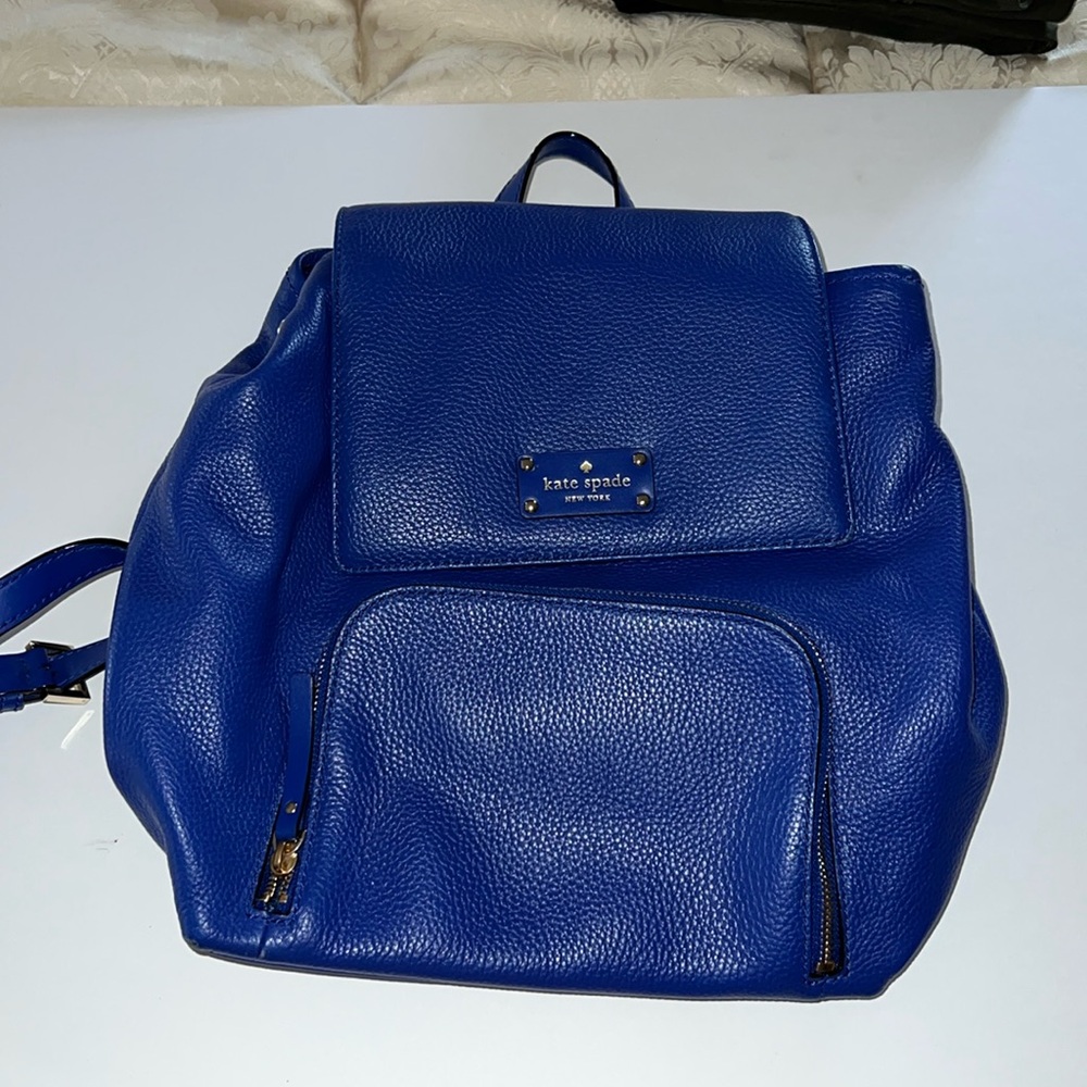 Kate Spade Cow leather blue backpack.